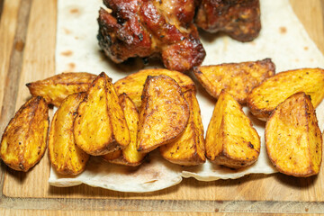 Grilled meat with potatoes and onion