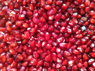 Red color raw ripe Pomegranate seeds