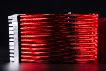 ATX cable for motherboard power on black background
