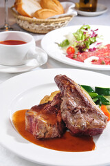 A Dish Of Roasted Beef With Mixed Vegetables