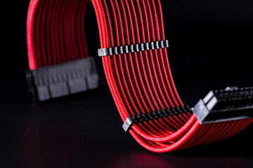 ATX cable for motherboard power on black background