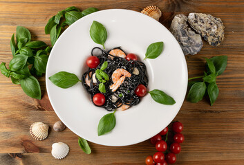 Black Spaghetti with Shrimps on White Restaurant Plate