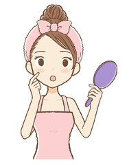 手鏡を持って考えるルームウエア女性　上半身