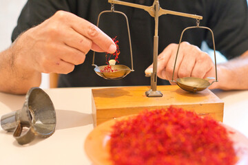 Weighing of saffron, Franco Sanna, San Gavino, Cagliari, Sardinia, Italy