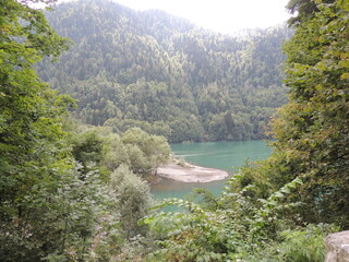Turquoise color of the water in the reservoir. Lake. River. Nature. Landscape.