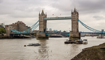 Fototapeta na wymiar The historic Tower Bridge on the River Thames on a cloudy day in London