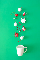 Christmas background with decorations on green background