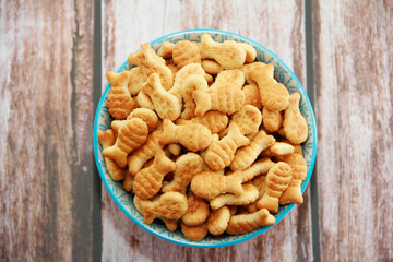edible dry cookies in the shape of a fish