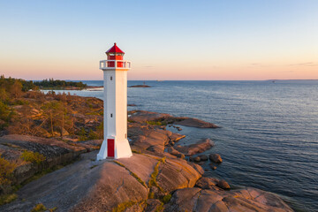 Lighthouse on the island. Aerial view.