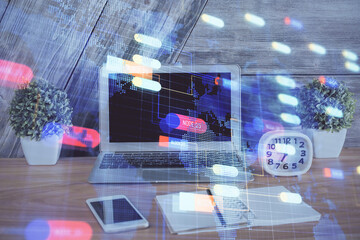 Double exposure of computer and technology theme hologram. Concept of freelance work.