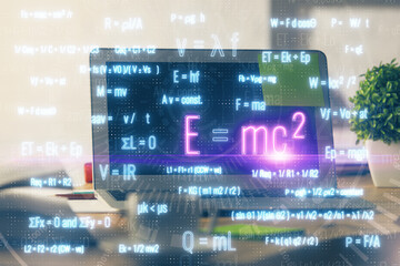 Desktop computer background and formula hologram writing. Double exposure. Education concept.