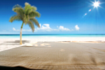 Desk of free space and summer background of beach 