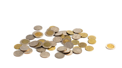 A collection of Thai  baht coins on a white background. This coin is denominated in Thai baht.