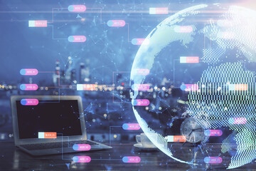 Multi exposure of table with computer and world map hologram. International data network concept.