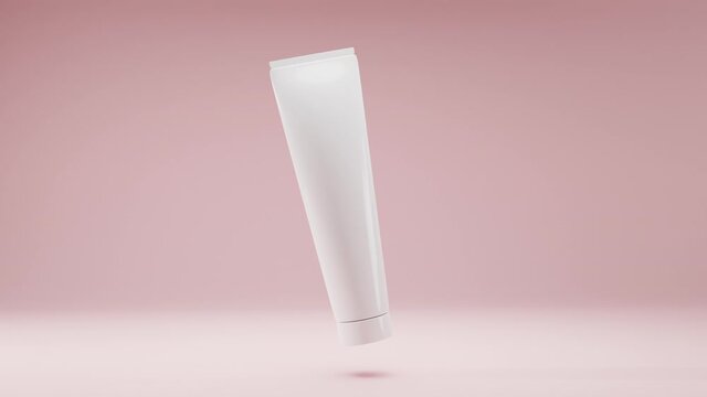 Cosmetic white package, plastic tube for bb-cream, scrub, tonic, toothpaste, body care. Realistic 3D model bottle on gently pink background slowly rotates in air for product design and advertising.