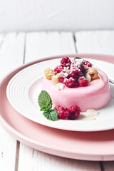Raspberry panna cotta dessert.