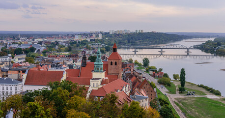 Obraz premium Sightseeing of Poland. Cityscape of Grudziadz, wide panoramic view of the city and Wisla river