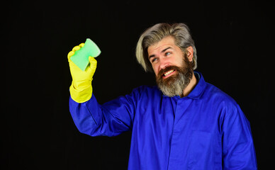 House cleaning. bearded man doing housework and cleaning. handsome man with washing gloves. Morning hygiene. Husband housekeeping and cleaning concept
