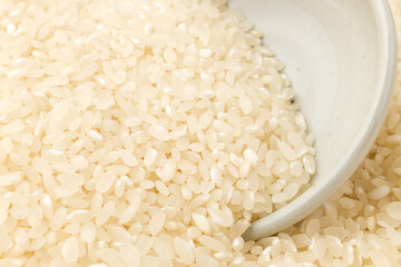White rice on white background