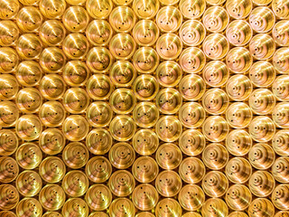 an abstract flat industrial close-up background of shiny brass metal threaded hexagonal fitting...
