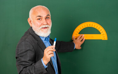Develop attitude openness and flexibility towards learning. Man bearded tutor chalkboard...