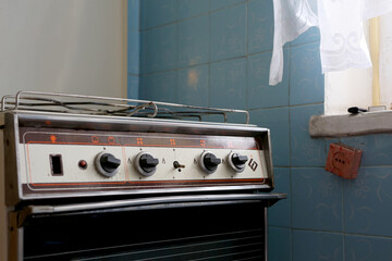 Old gas stove in the kitchen in an old apartment