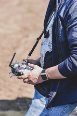 Fpv drone pilot with goggles and controllers