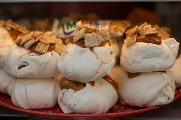 Cakes in patisserie, meringue, pastry shop