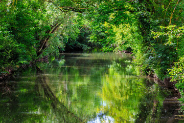 Beautiful green landscape on the Eure River in Central France..