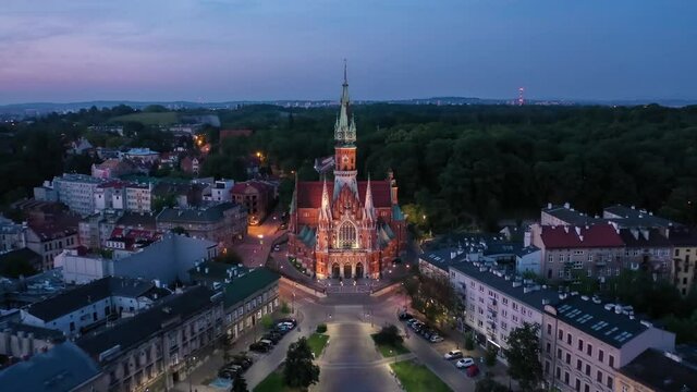 Aerial view of gothic Saint-Joseph church at dusk in Krakow, Poland
