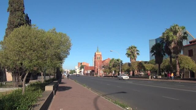HD summer day video of Bloemfontein town, its buildings, streets and parks. Bloemfontein is a historical (est. 1846) SA town, located in Free State Province, South Africa
