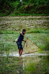 young man fishing