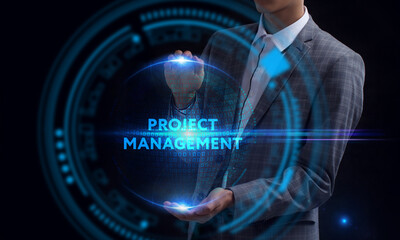 Business, Technology, Internet and network concept. Young businessman working on a virtual screen of the future and sees the inscription: Project management