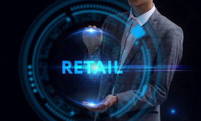 Business, Technology, Internet and network concept. Young businessman working on a virtual screen of the future and sees the inscription: Retail
