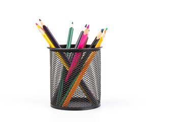 Colorful pencils in wire mesh cup on white background, education or back to school concept
