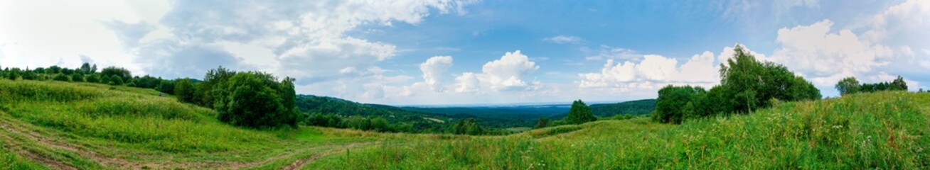 Fototapeta na wymiar Mountain valley village landscape. Mountain valley village panorama. Mountain green valley village view