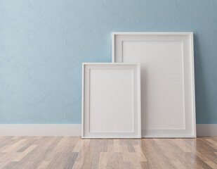 Two vertical white frame mock up, white frame on blue wall, 3d illustration