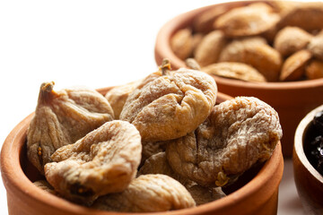 Fototapeta premium Organic figs in the plate. Natural fruit.