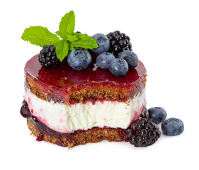 Cheesecake with fresh mint, blueberries and blackberries, jam and jelly