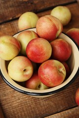 Juicy nectarines on a wooden table macro