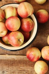 Juicy nectarines on a wooden table macro