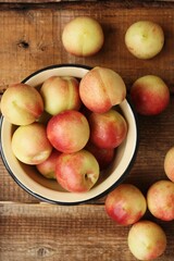 Juicy nectarines on a wooden table macro