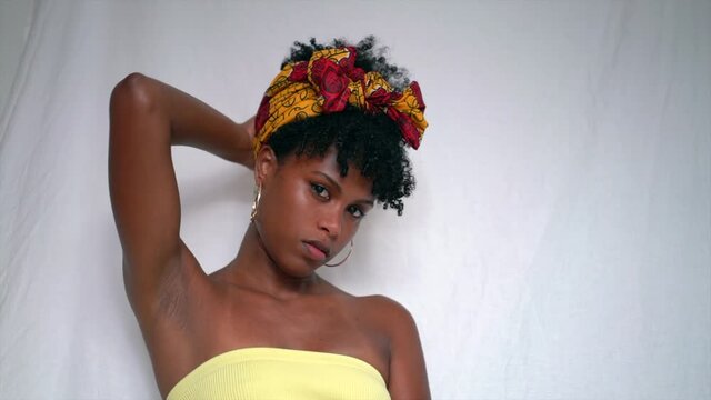 Black woman with head scarf