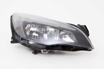 car spare part headlights on white background