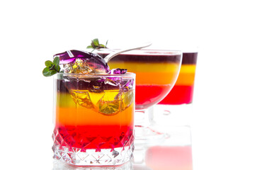 Sweet multi-colored fruit puff jelly in a glass cup