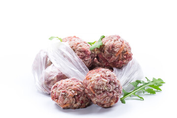 frozen raw meatballs from beef and pork with carrots and rice