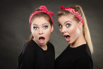 Crazy pin up retro girls making funny faces.