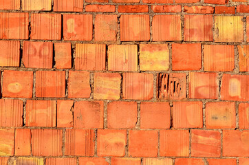 Fototapeta premium texture of square corrugated red brick wall background
