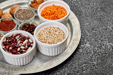 Beans and nuts selection in bowls. Healthy food