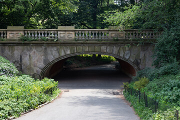 Fototapeta na wymiar Tunnel and Bridge at Central Park during Summer in New York City